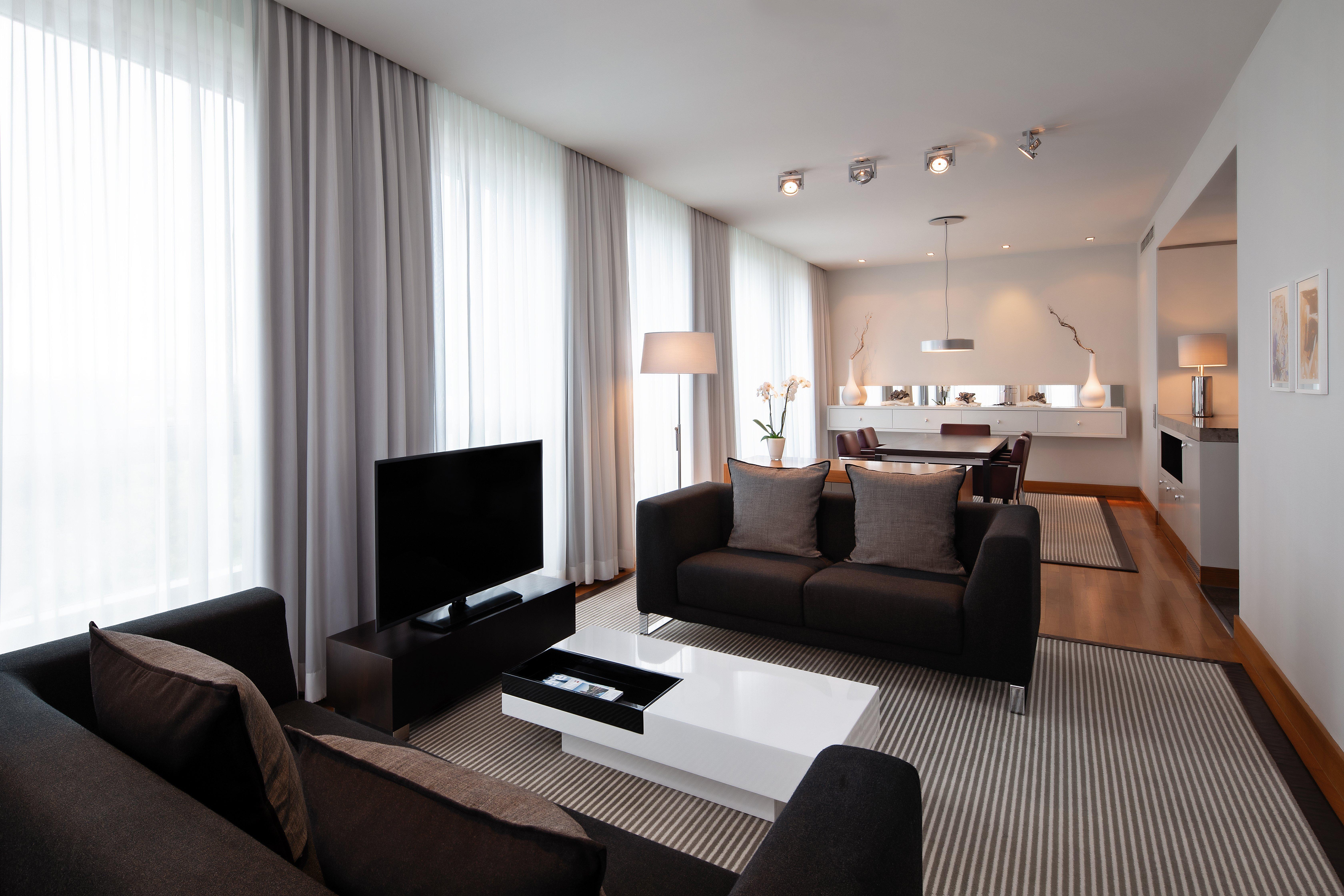 Intercontinental Berlin By Ihg Hotel Exterior photo A living room in a serviced apartment in Berlin, Germany