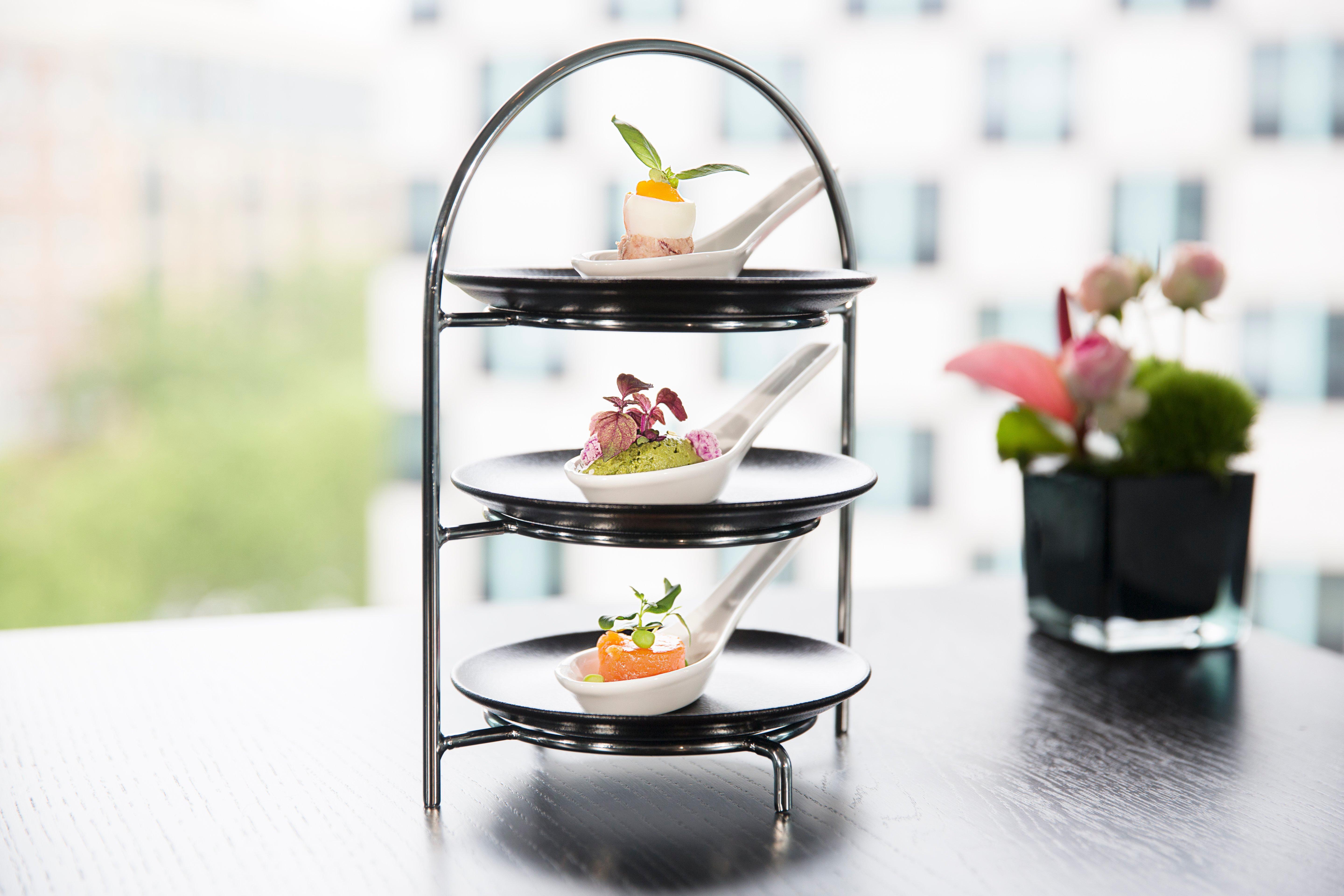 Intercontinental Berlin By Ihg Hotel Exterior photo A three-tiered serving stand